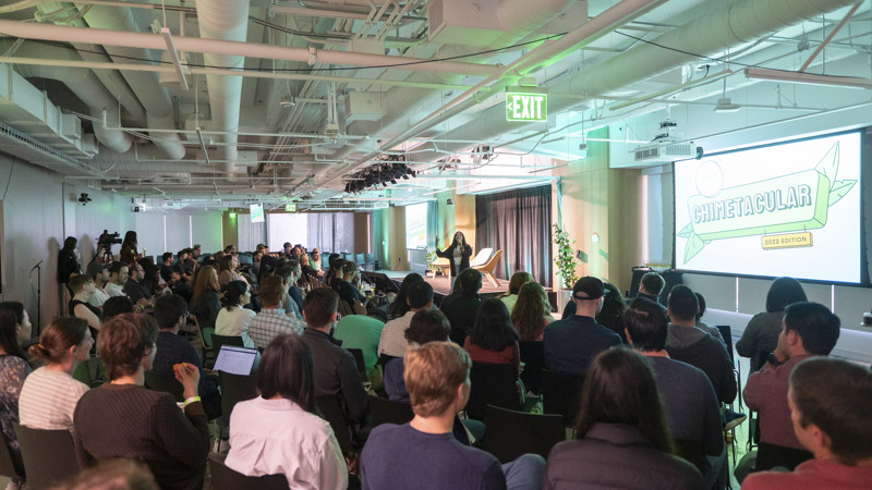 People sitting at a Chime conference meeting watching a presenter.