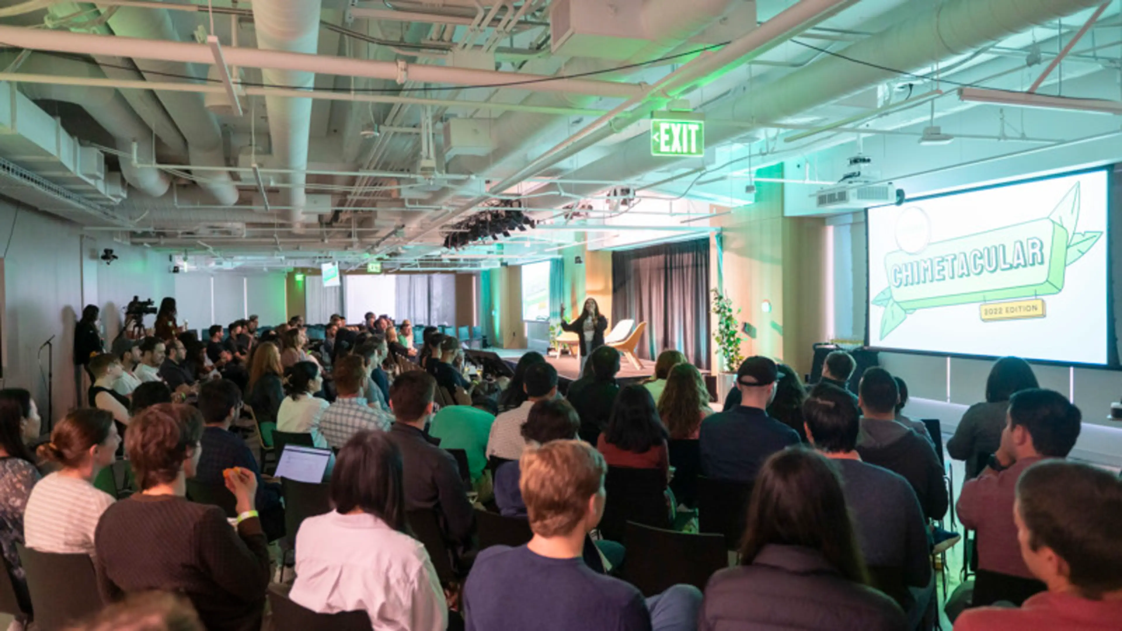 People sitting at a Chime conference meeting watching a presenter.