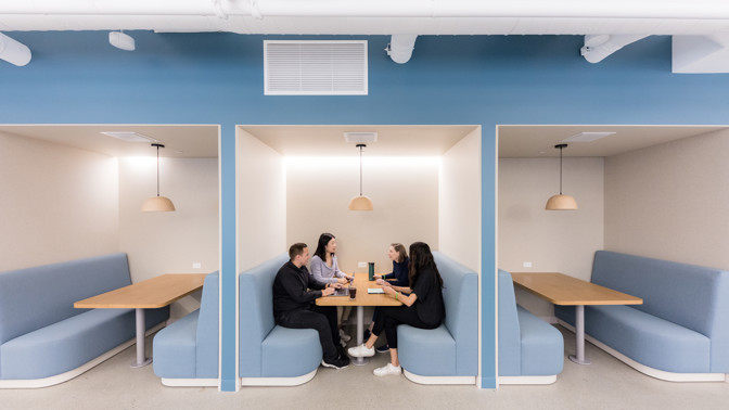 A group of people sitting at a table