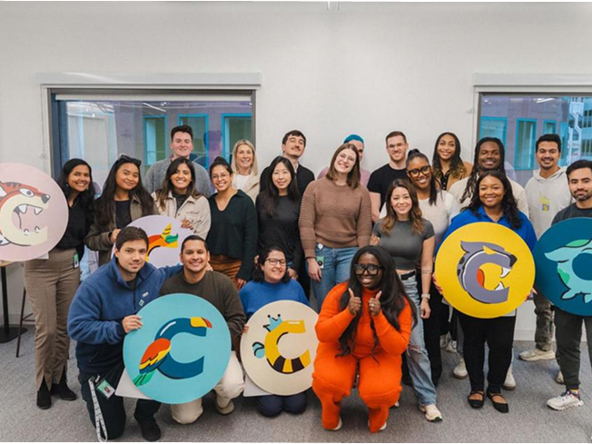 A group of people holding signs
