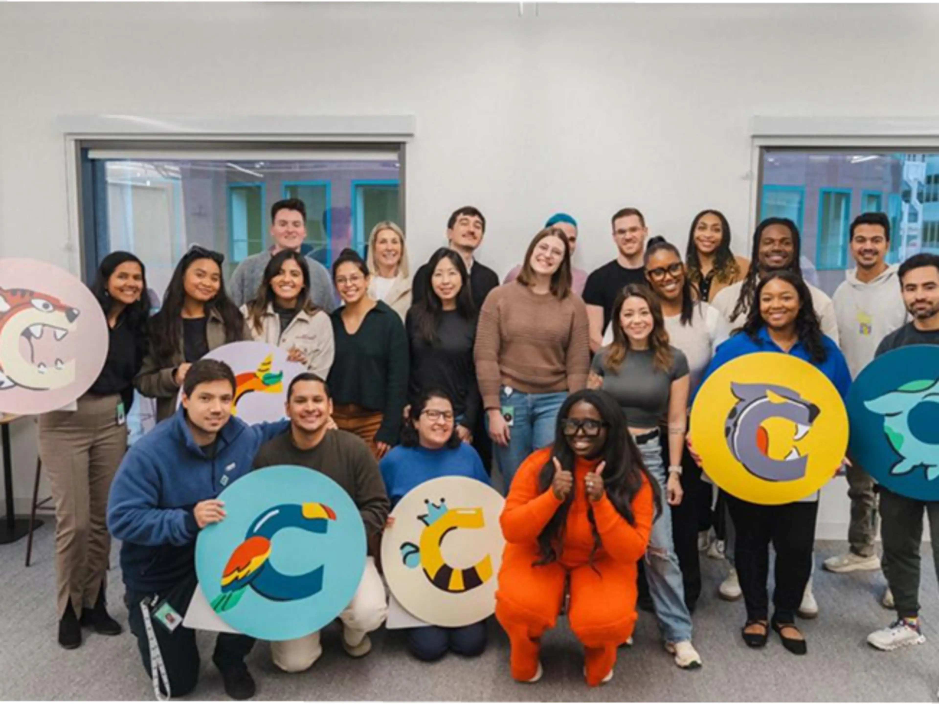 A group of people holding signs