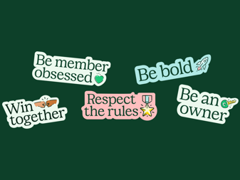 a group of stickers on a green background