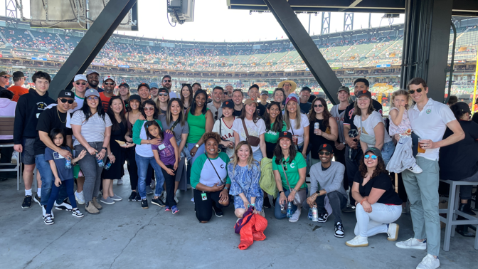 a group of people posing for a photo